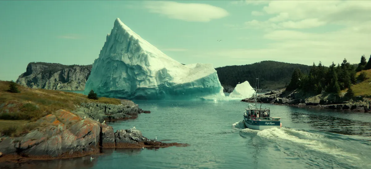A fishing boat approaches an iceberg in Below. Official promotional still: Jan Thijs / Netflix.